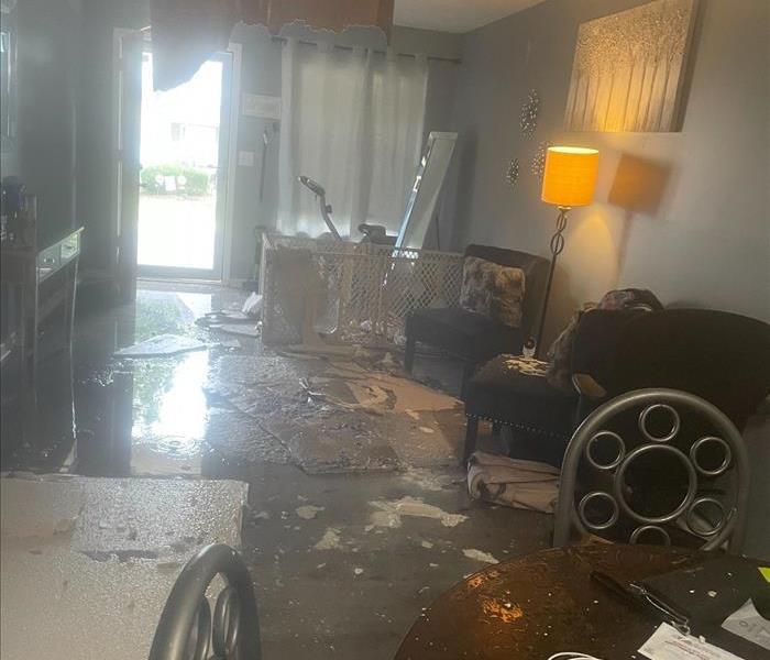 Ceiling fell through, water damage and standing water.